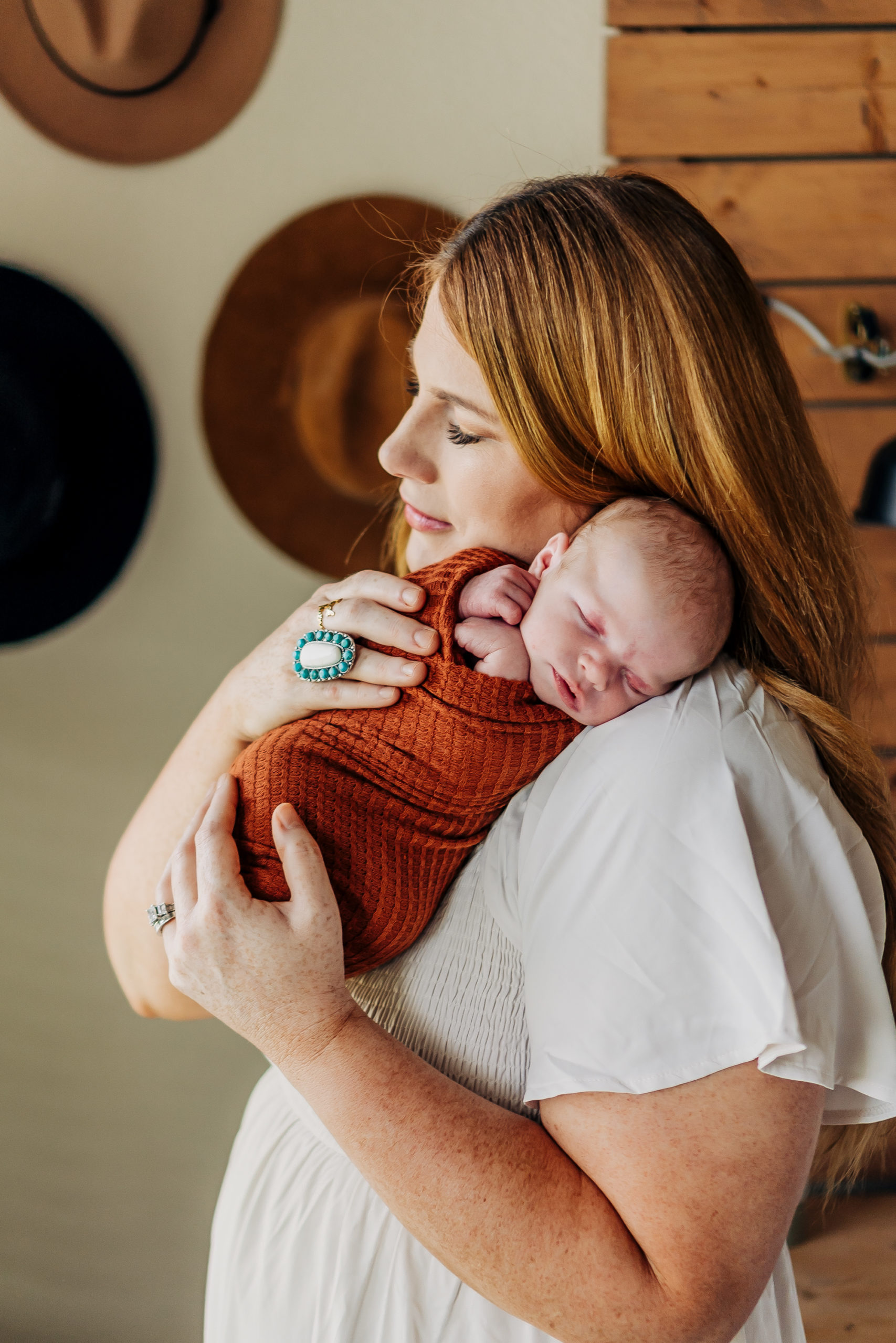 Baby in Orange Swaddle and Nursery in In-Home Newborn Session | In-Home Newborn and Family Session | Frisco, Texas Photographer | via brittnierenee.com