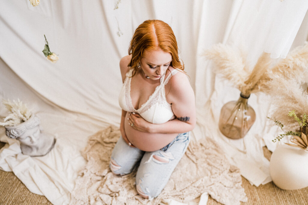 Boho bare belly maternity photo session in Dallas Texas indoor studio