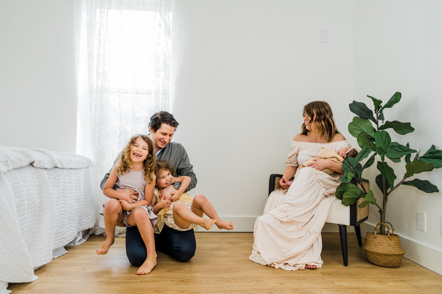 A candid family newborn session in a Dallas studio was so fun for this family of 5! They just added their last baby girl to the family and knew they wanted to commemorate this with a newborn session. | Dallas Family Photographer | Brittnie Renee Photo