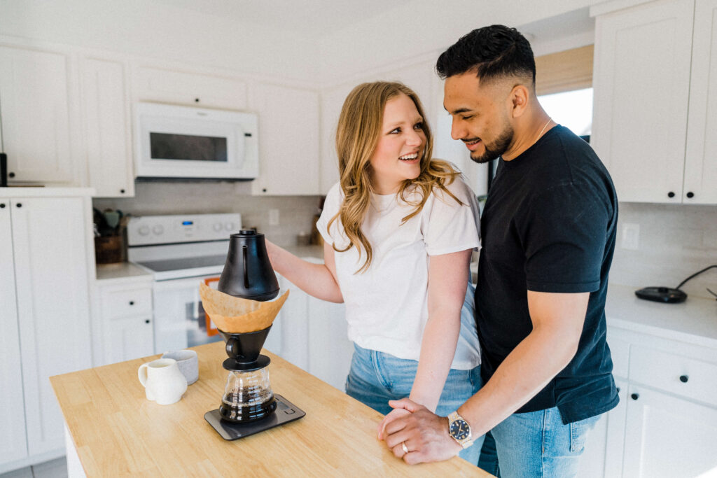 Couple making coffee at in home photo session by Dallas Family photographer